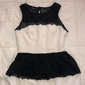 Bebe black/white lace detailed peplum top